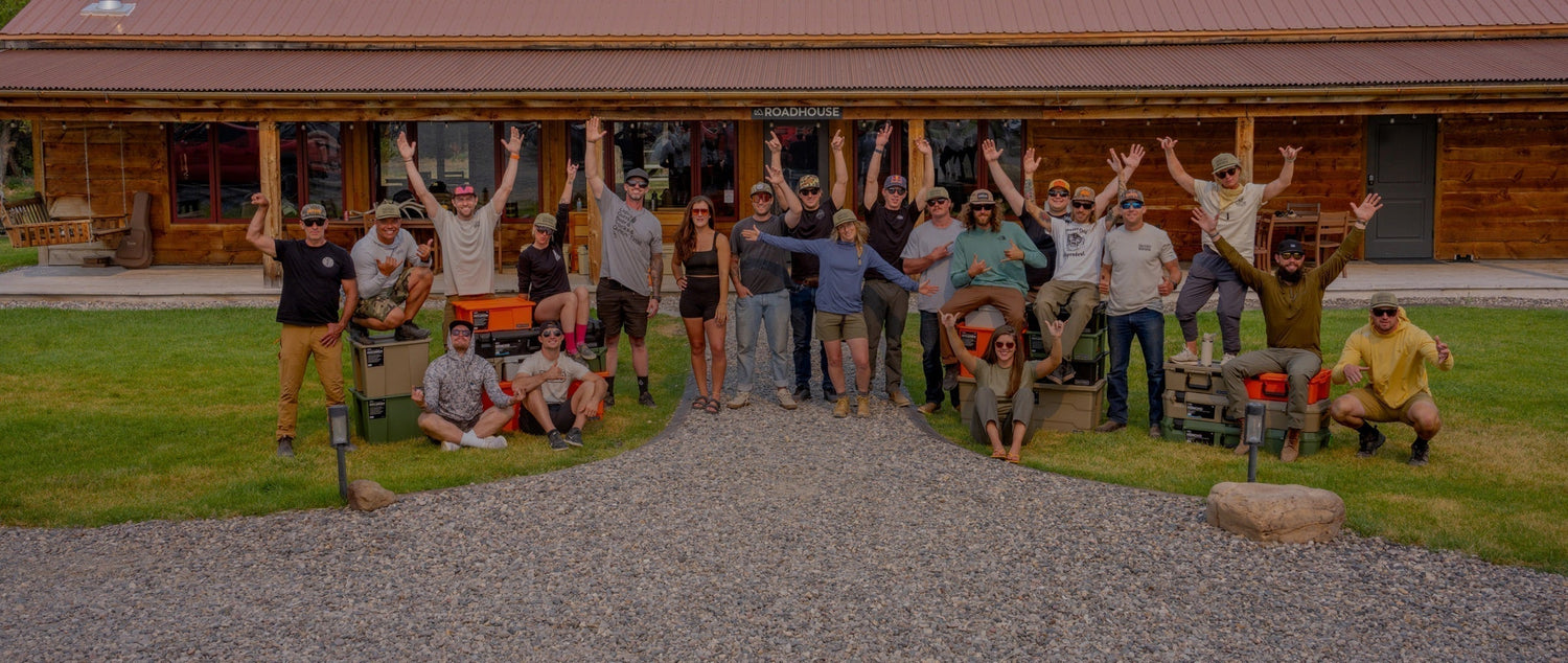 DECKED ambassadors all raising their hands and smiling for a photo.