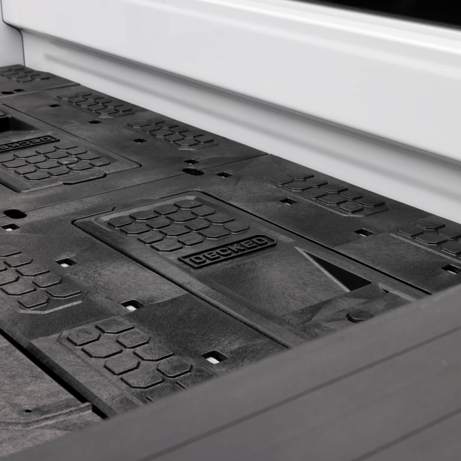 A close up of the 8' Load Floor which lengthens the deck of the Drawer System and adds the capacity for 4 more stash bins to your DECKED system.