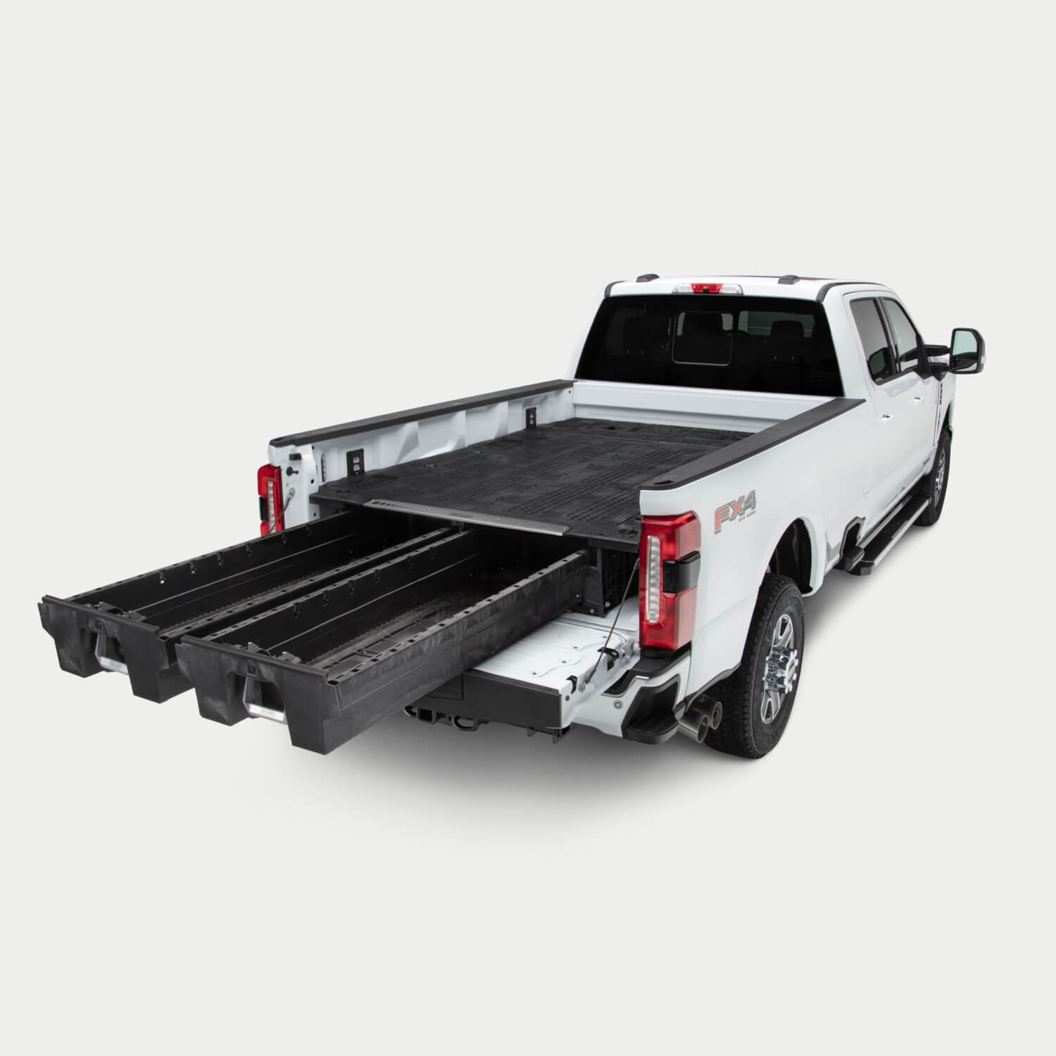 An 8 foot bed truck with the Drawer System and Load Floor that spans the full bed of the truck. The Drawers are fully extended with nothing inside.