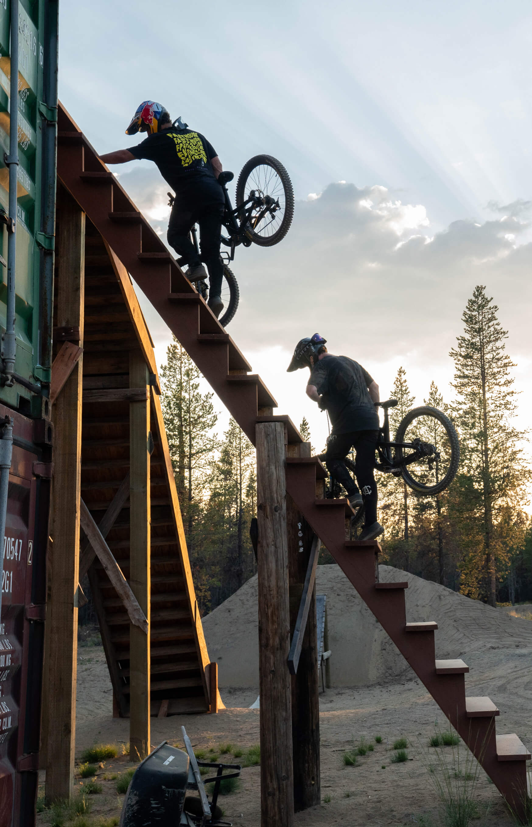 Who needs elevation to make mountain bike jumps? Carson stacked multiple shipping containers, one on the other, as a high point to gain speed for his jumps. The stairs to the top look scary enough for us.