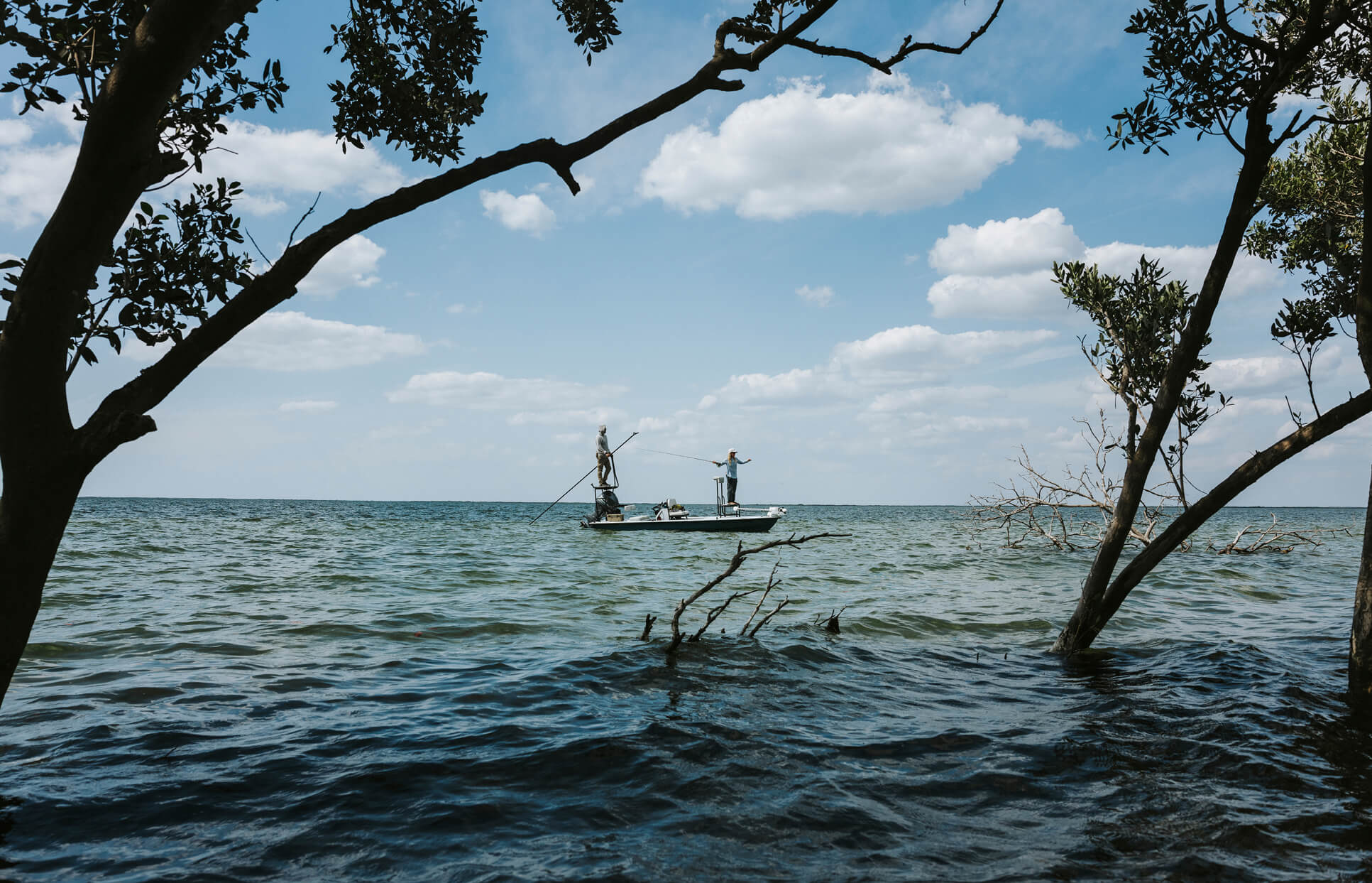 You might be off Florida’s Nature Coast if: Trees grow out of the water. These shallows do a number on outboard motors, but Lacey Kelly knows how to navigate them.