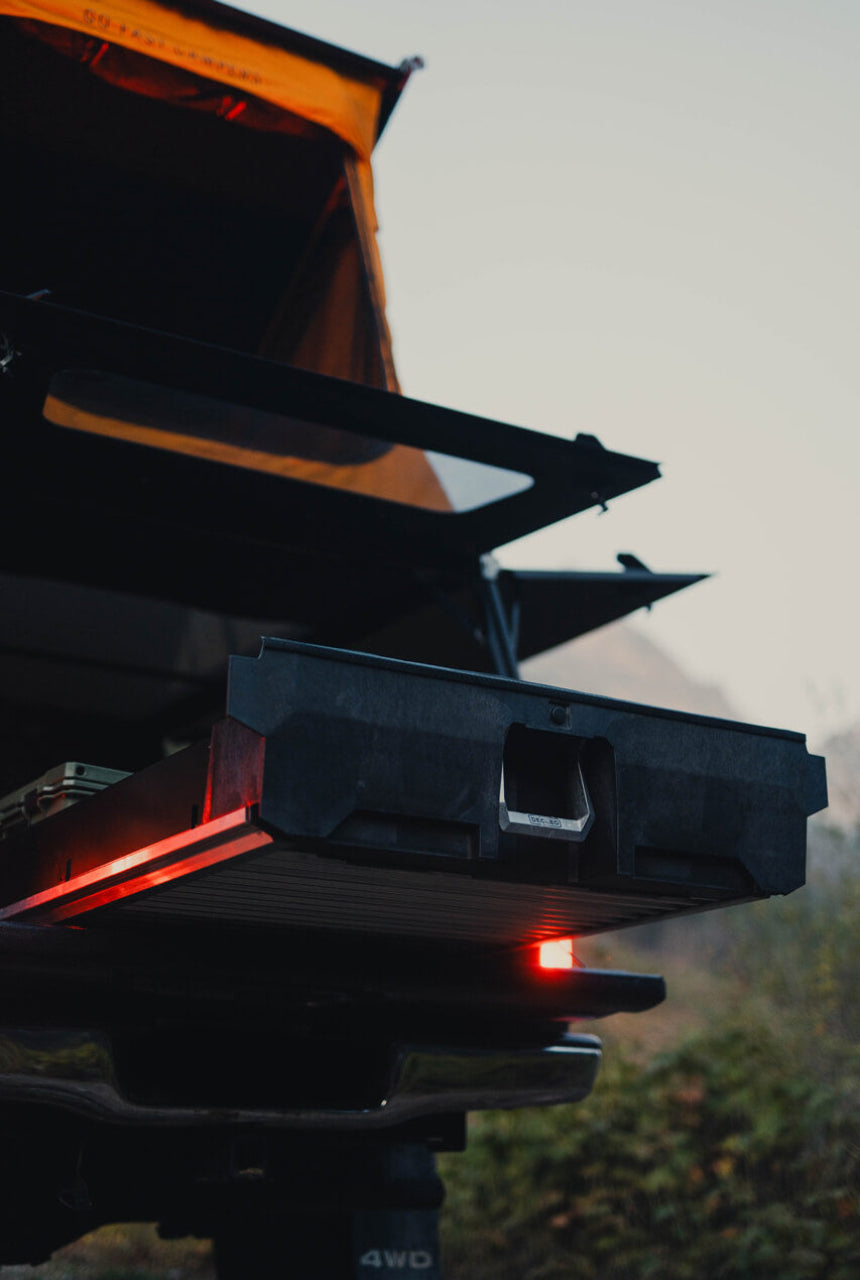 Roof rack and a Drawer System on a vehicle with a mountainous background