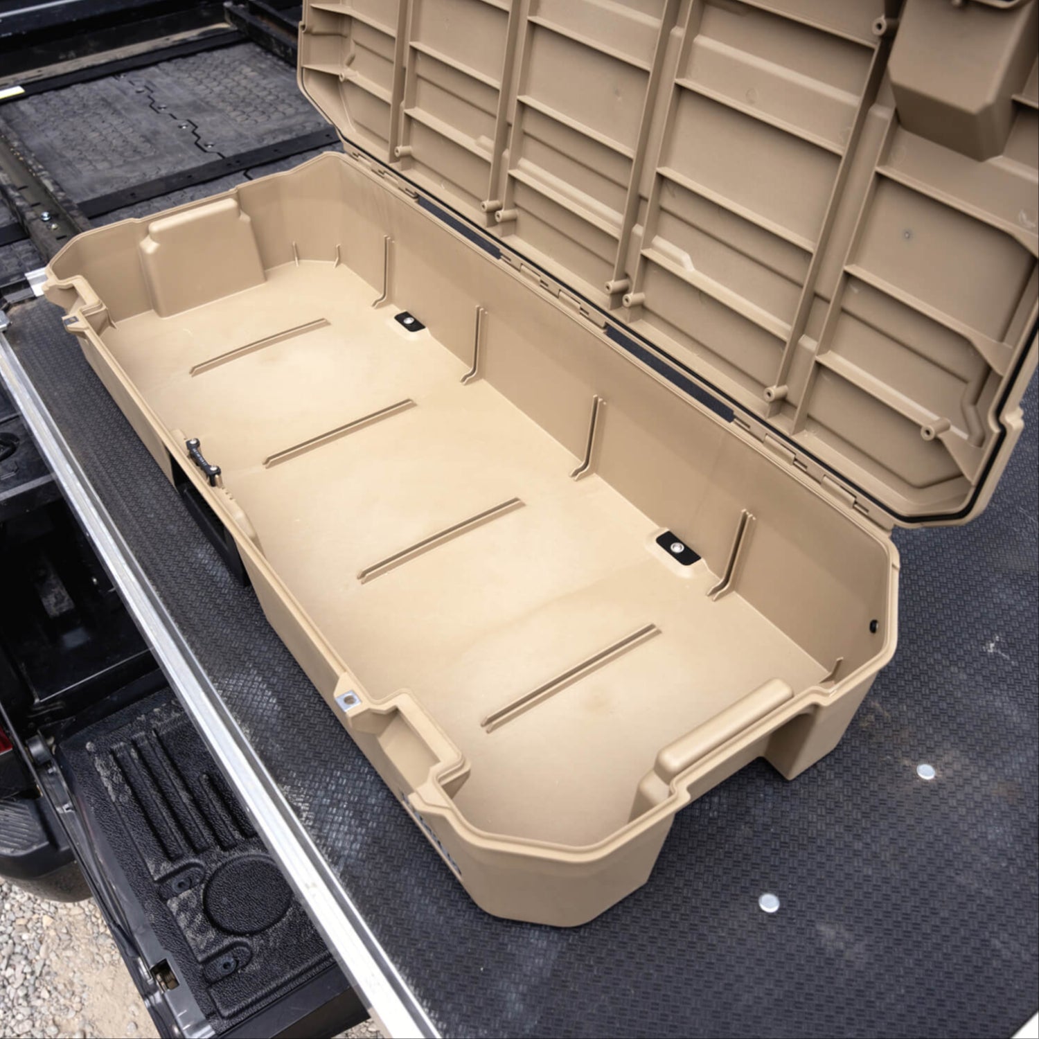 A Desert Tan DECKED Honcho D-co case mounted to a CargoGlide.