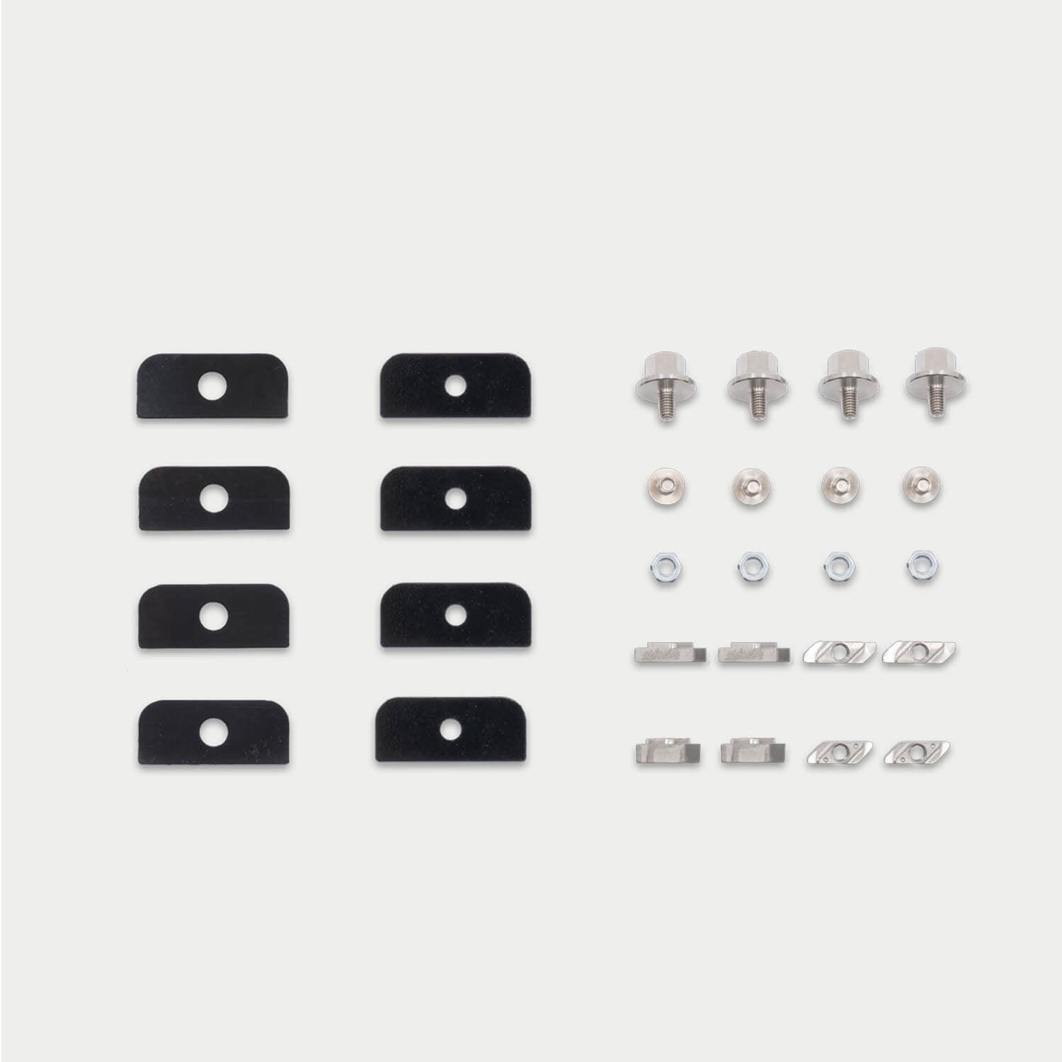 All of the nuts and bolts that make up the D-co Mounting Kit to T-Track for Honcho storage case.