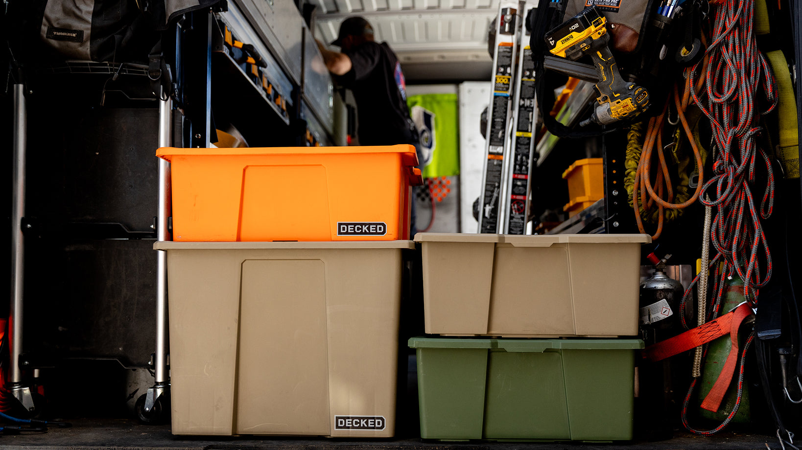 DECKED bins loaded inside a van.