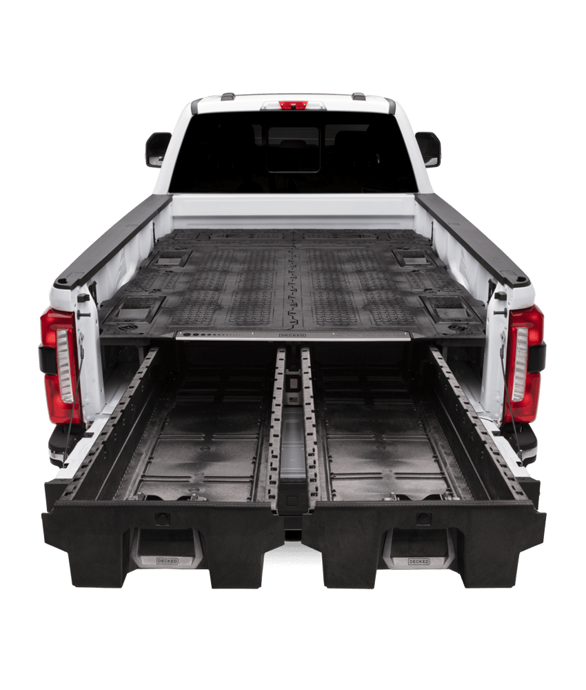 An 8 foot bed truck with the Drawer System and Load Floor that spans the full bed of the truck. The Drawers are fully extended with nothing inside.