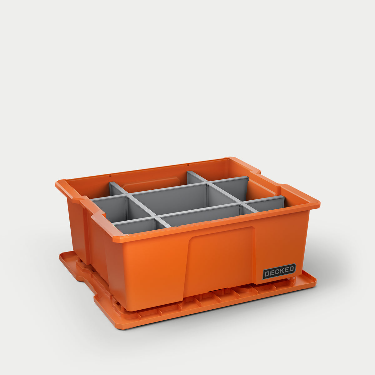 One orange DECKED payloader bin with grey POD divider system inside of it.