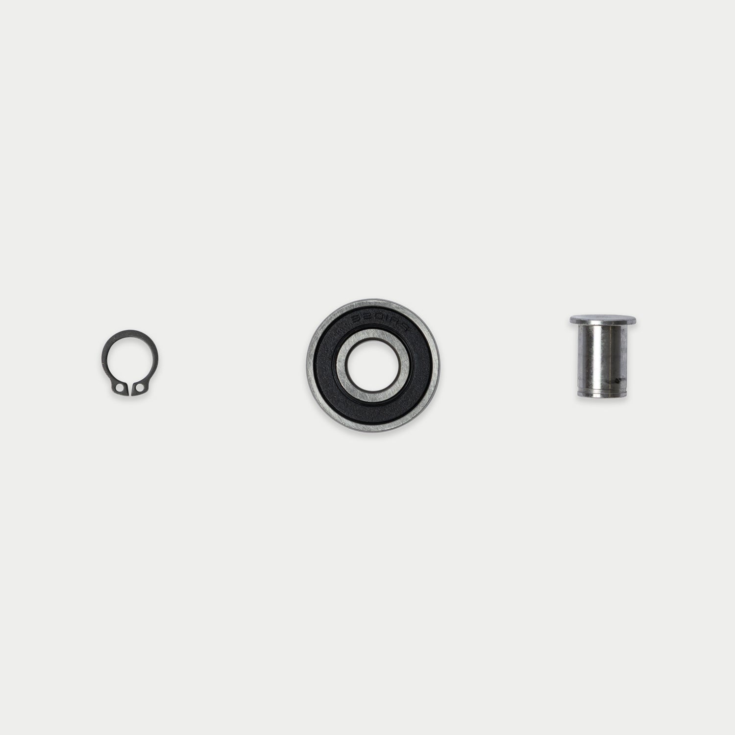 CargoGlide bearing, axle, and clotter pin on light grey background.