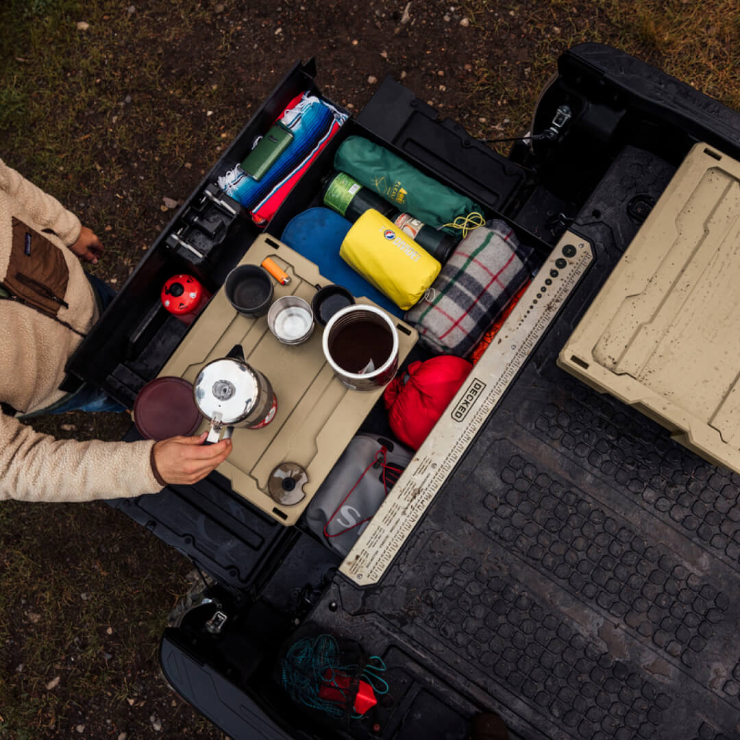 Tan Payloader inside a midsize Drawer System being used as a platform for making coffee