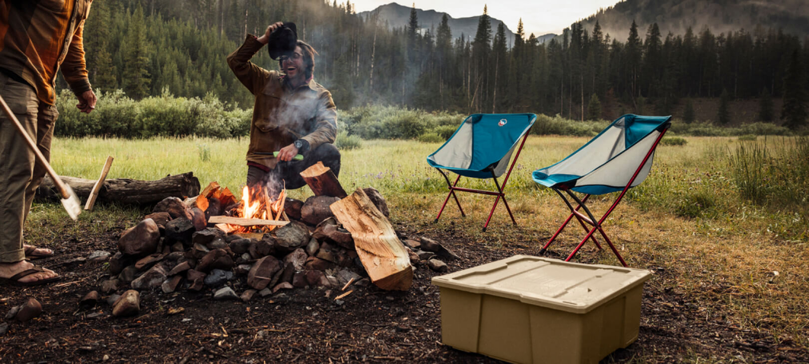 Tan Payloader next to a campfire