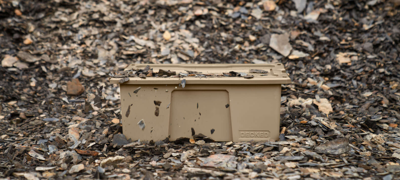 One Tan Payloader sitting in shale