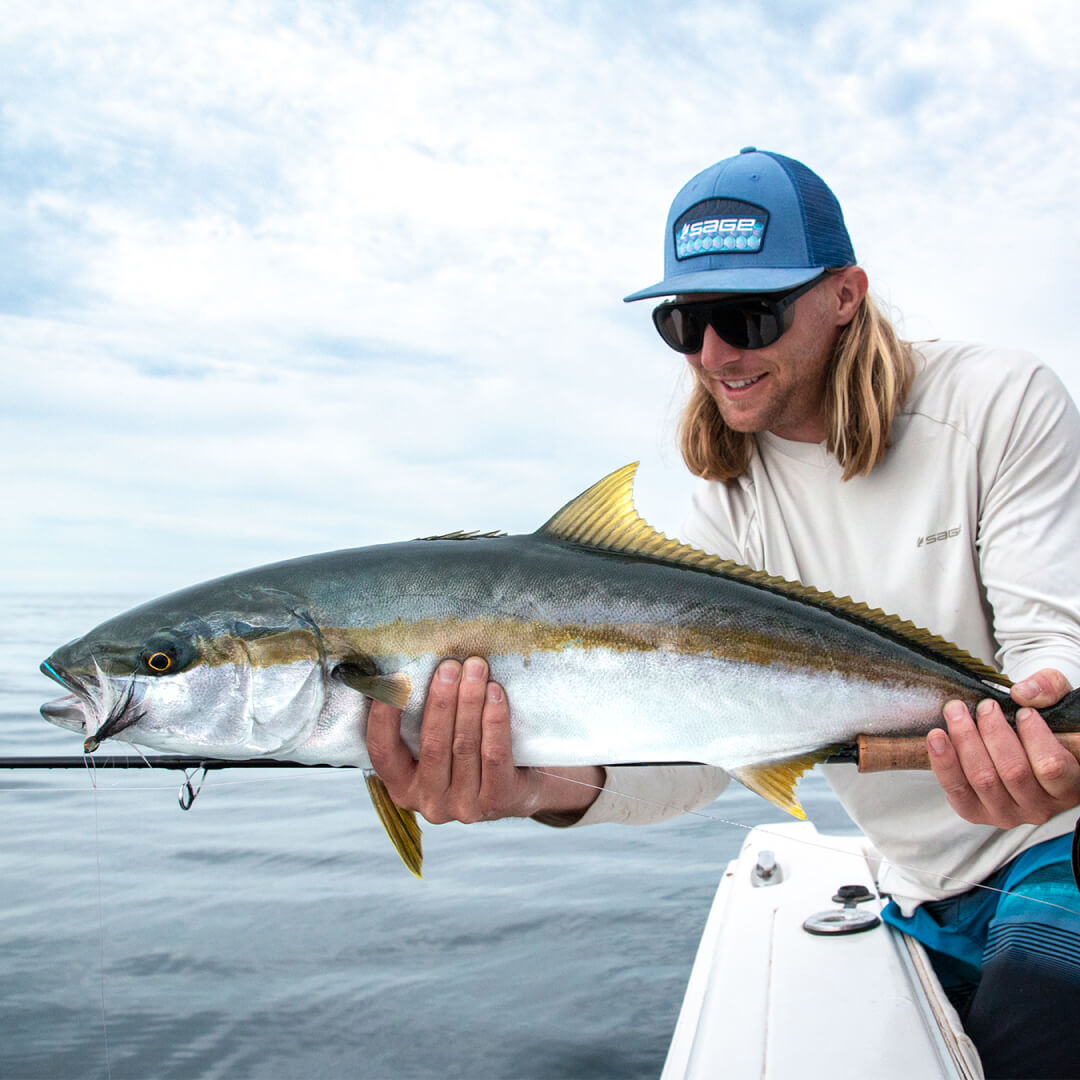 Seth Blackmore holding a fish