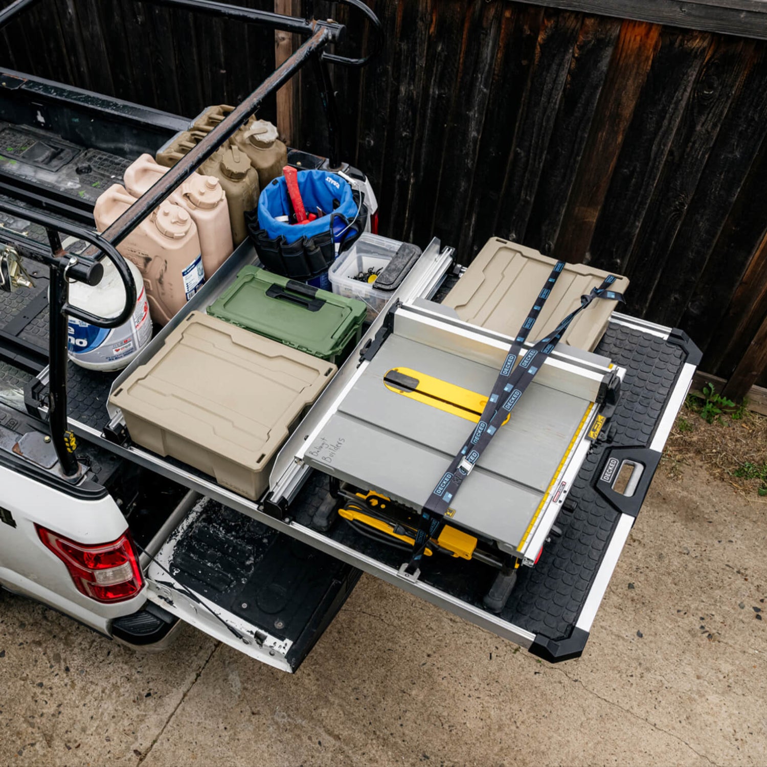 A bird's eye view of a bunch of tools and other gear neatly organized on the tray of the CargoGlide.