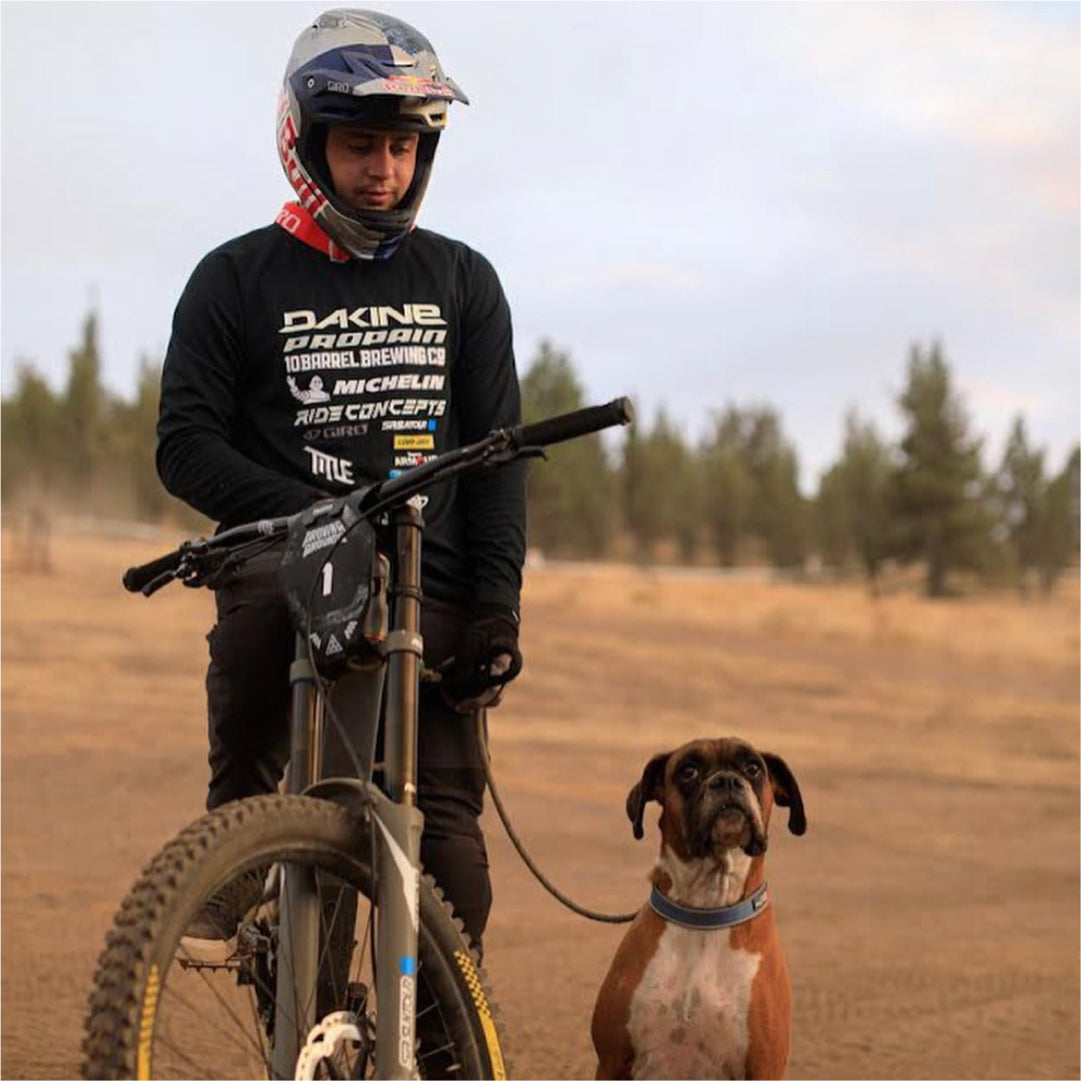Carson Storch, his bike, and his dog.