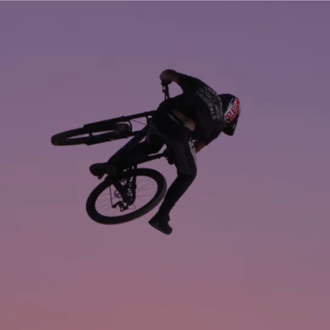 Carson Storch on his bike, midair.