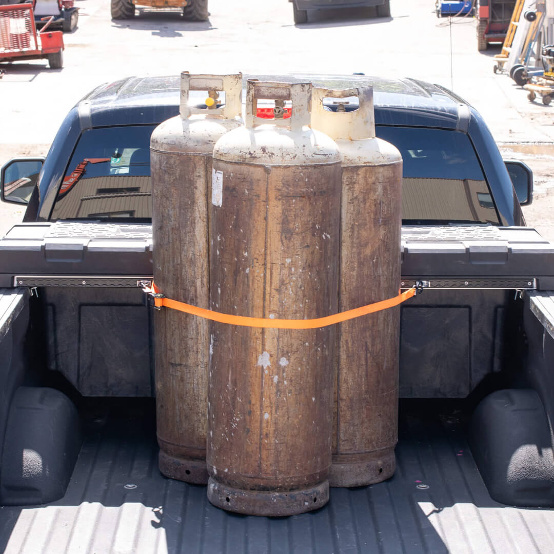 Large tanks secured to the DECKED Tool Box using Core Trax