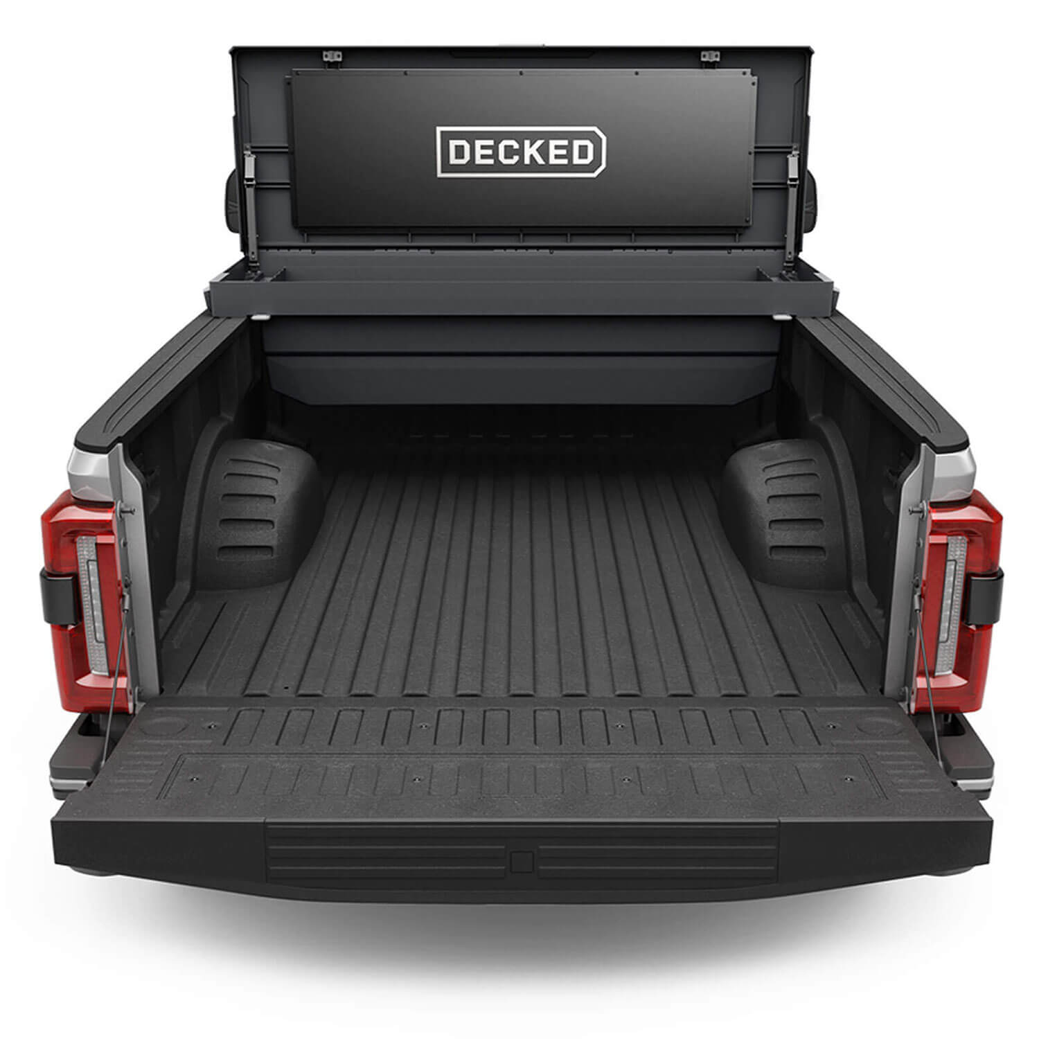An open black Tool Box in bed of a Ford F-350.