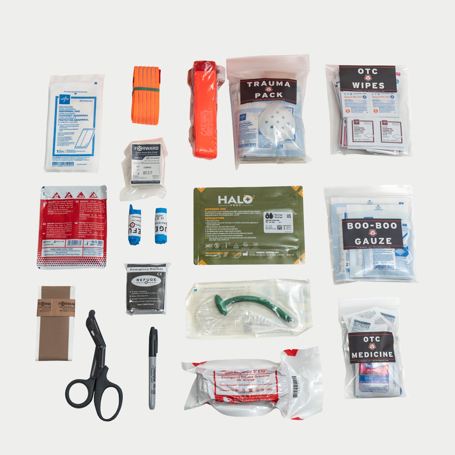 Items laid out that contribute to the 133 piece trauma response kit that is packed inside of the IFAK.