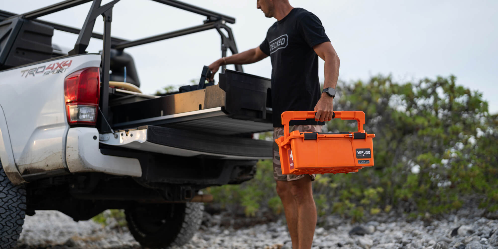 A man unloading his IFAK out of his Drawer System.