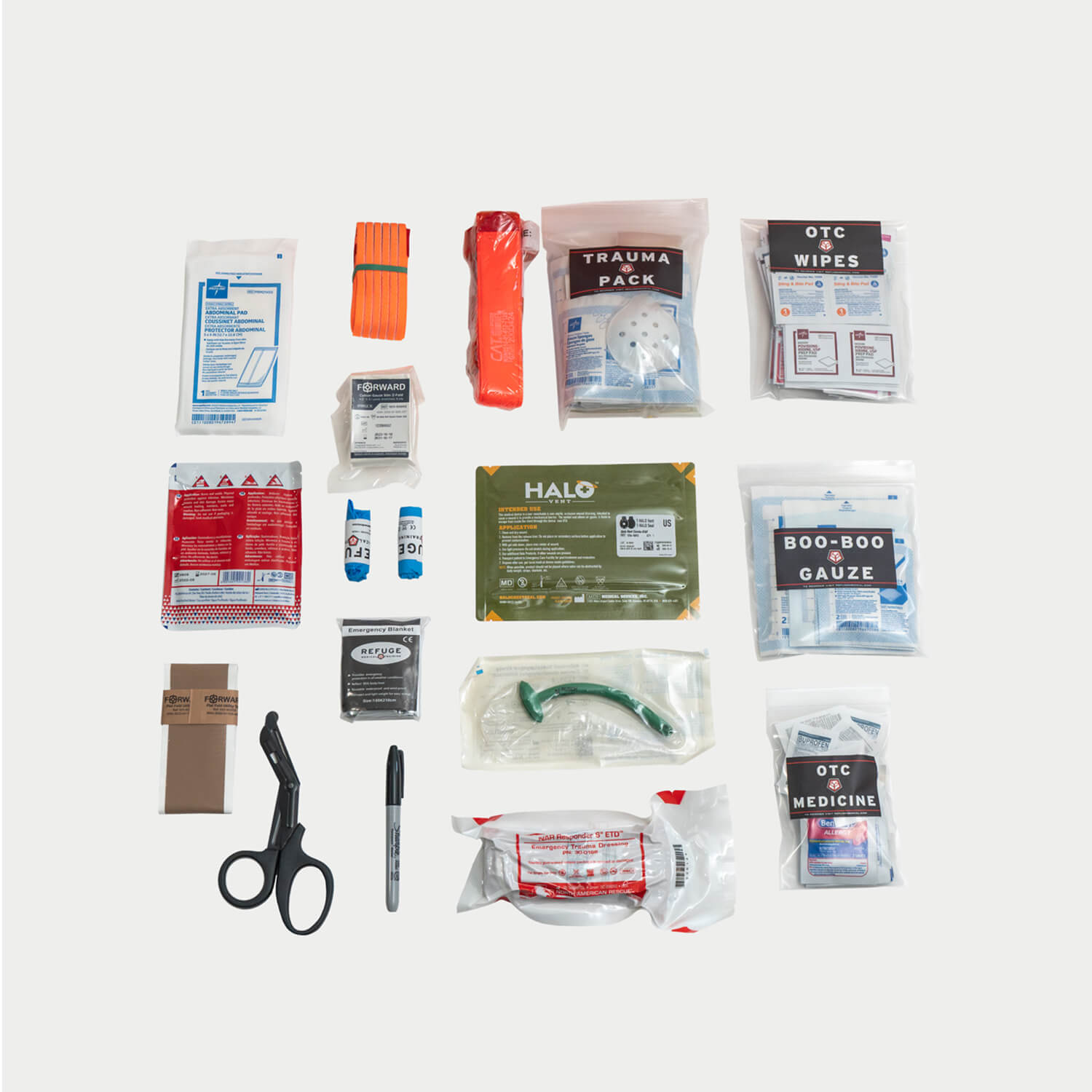 Items laid out that contribute to the 133 piece trauma response kit that is packed inside of the IFAK.