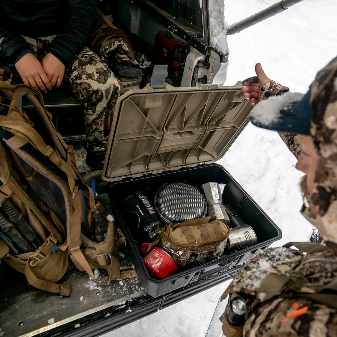 Tan D-box being used to store hunting gear