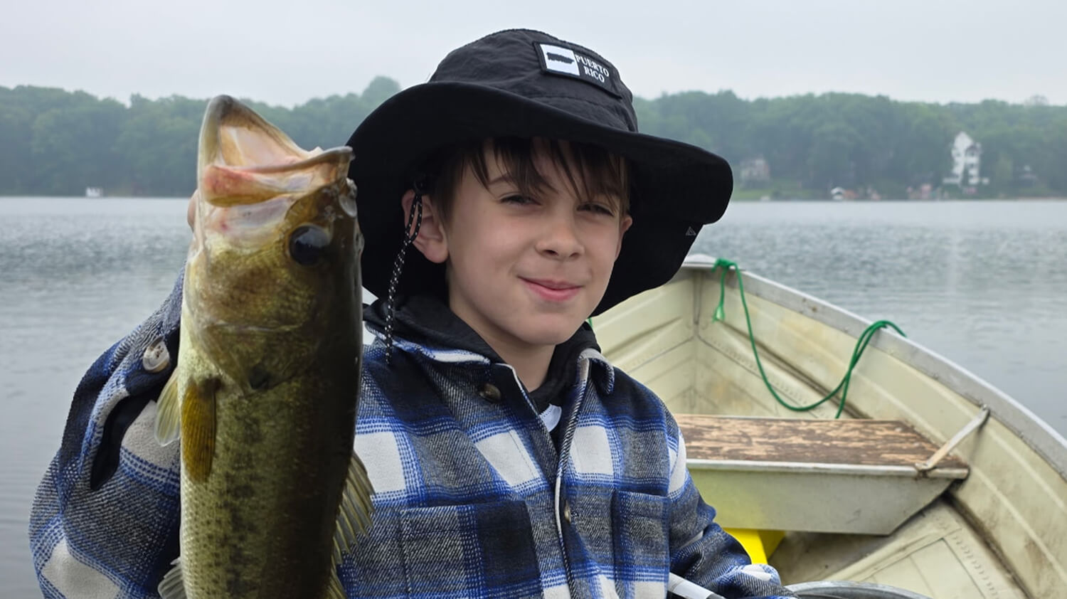 The son of a 2025 DTO winner holding up the fish he caught with his dad on dad's day off.