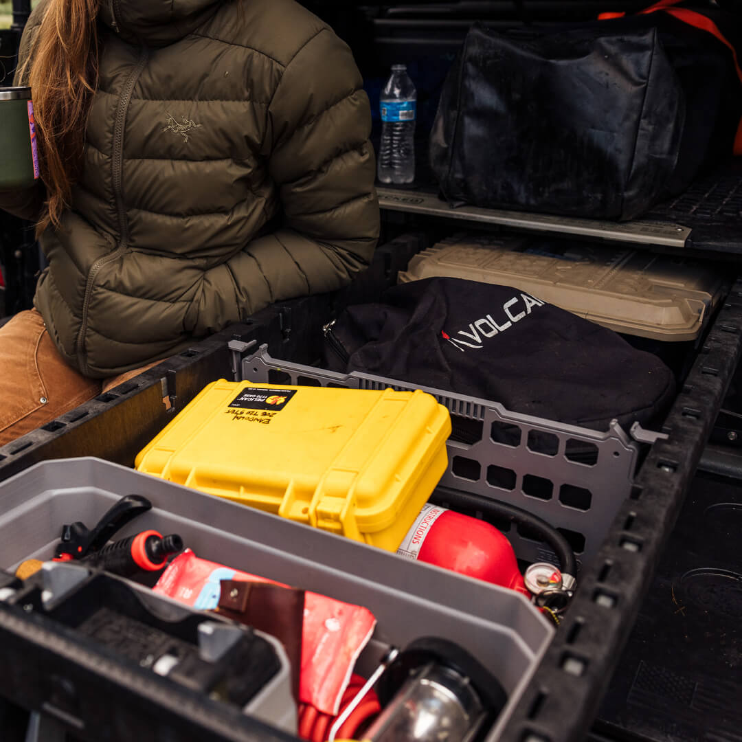 Image of a divider inside a drawer with gear compartmentalized