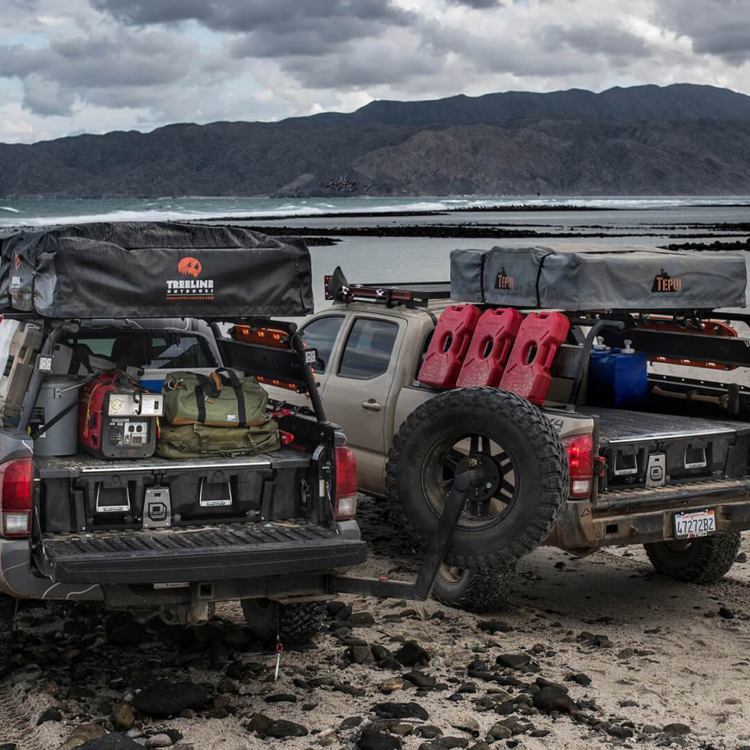 Backside of two midsize trucks with Drawer Systems installed in the bed