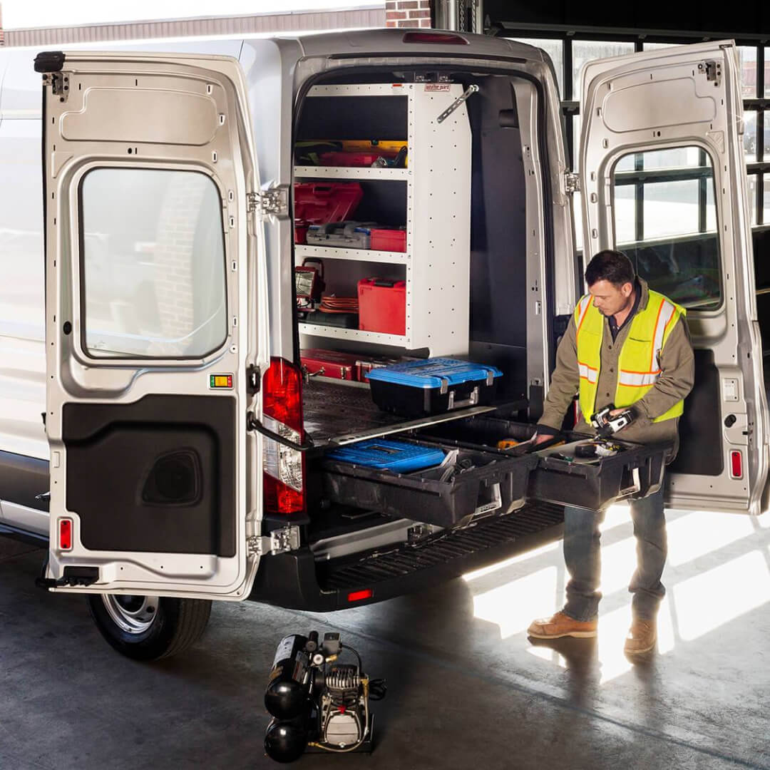 Man accessing tools inside a Drawer System inside a Cargovan