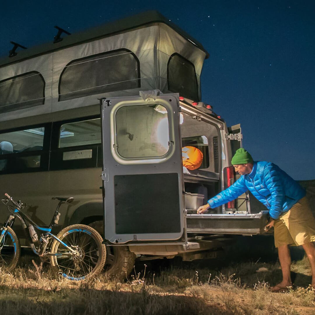 Drawer System inside an overland van with a popup tent camping