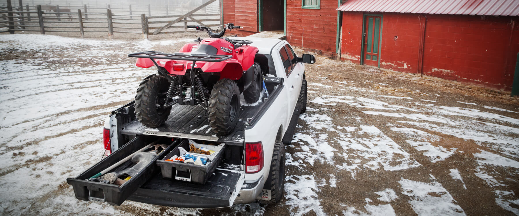 decked drawer system with an atv on top