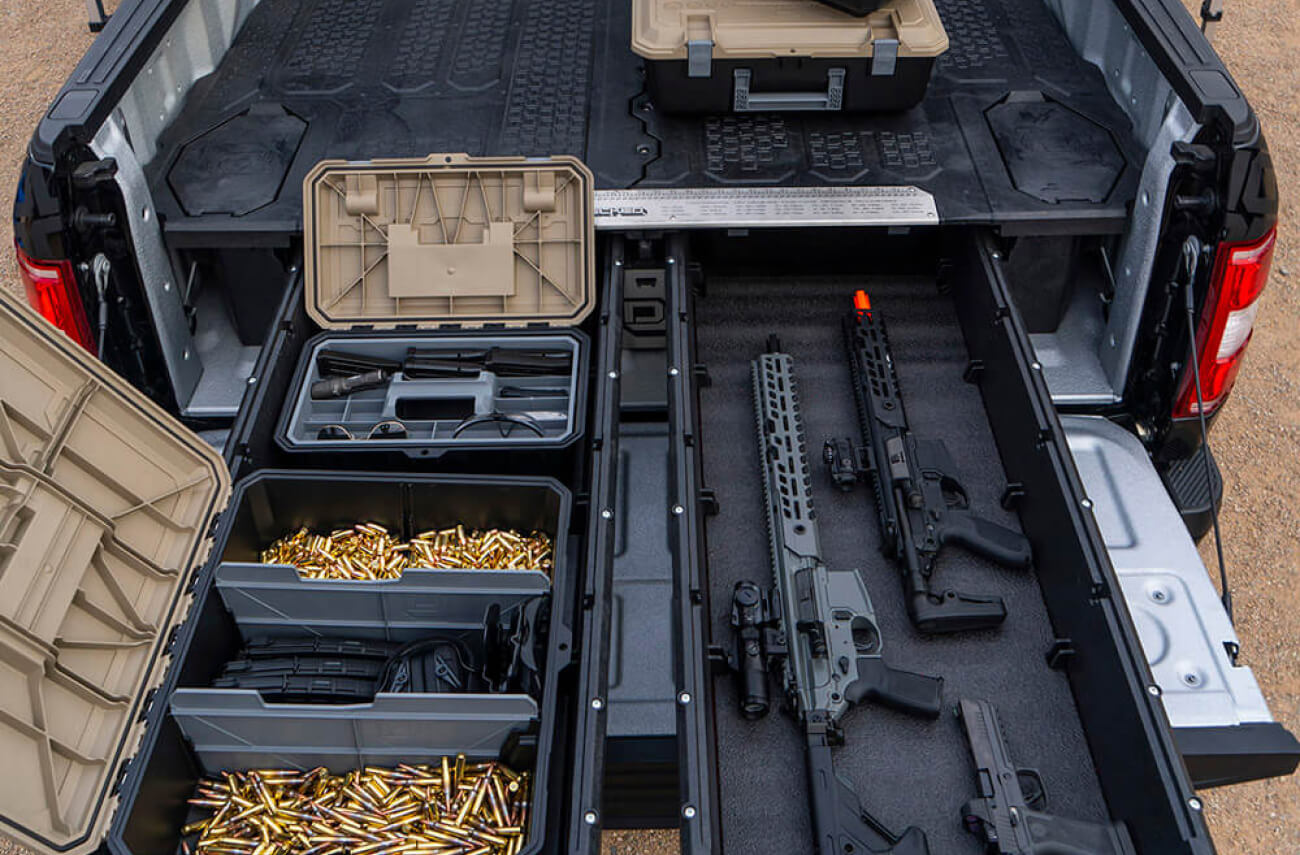 weapons and ammo stored in a decked drawer system