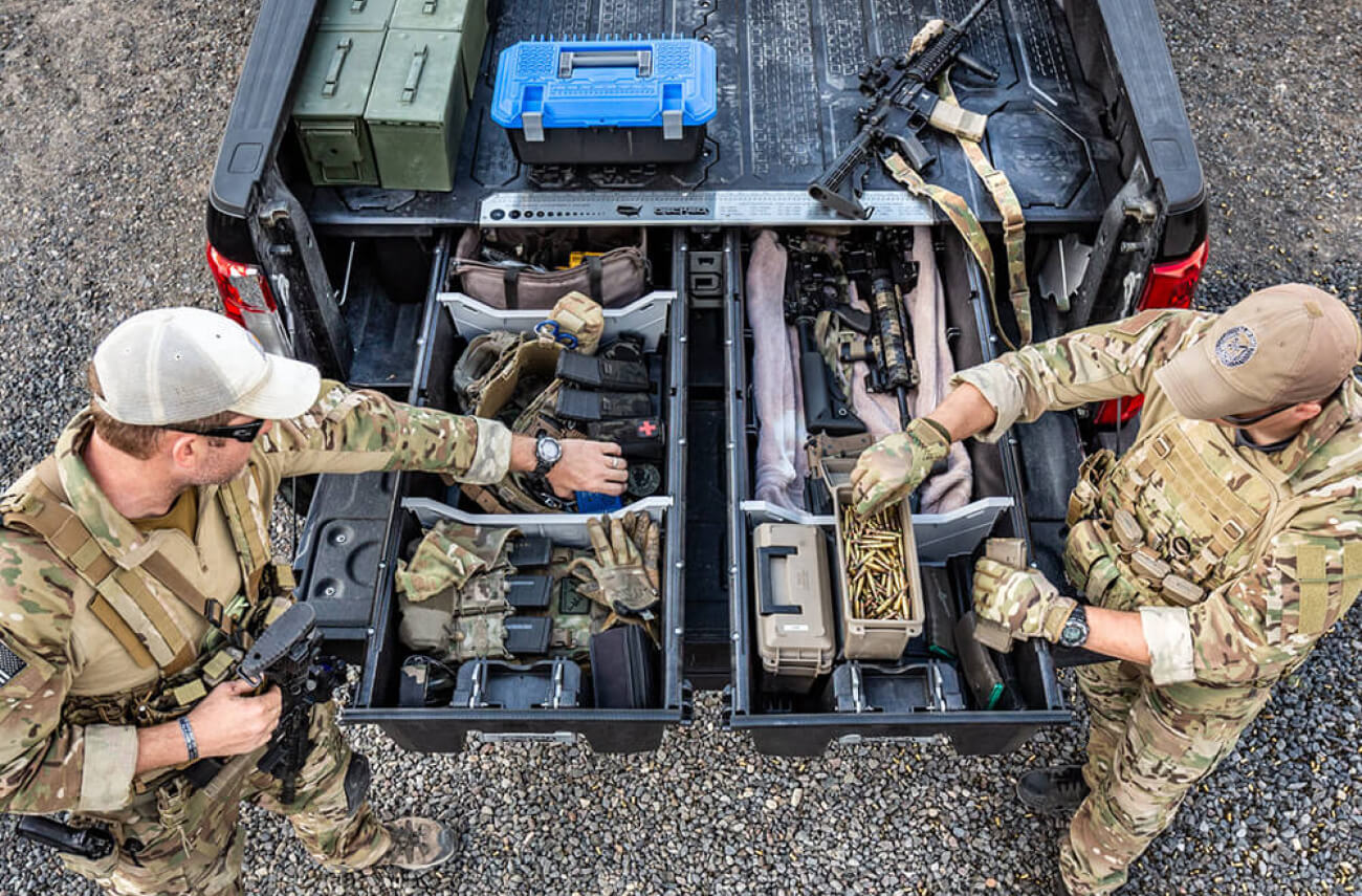 overhead view of military gear stored in a drawer system