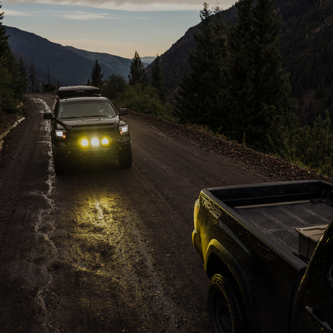 Trucks driving in the rain