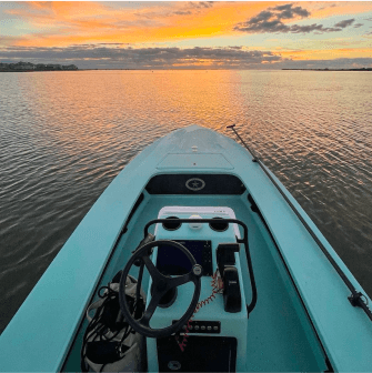 JT VanZant's view sitting at the helm of his boat at sunset.