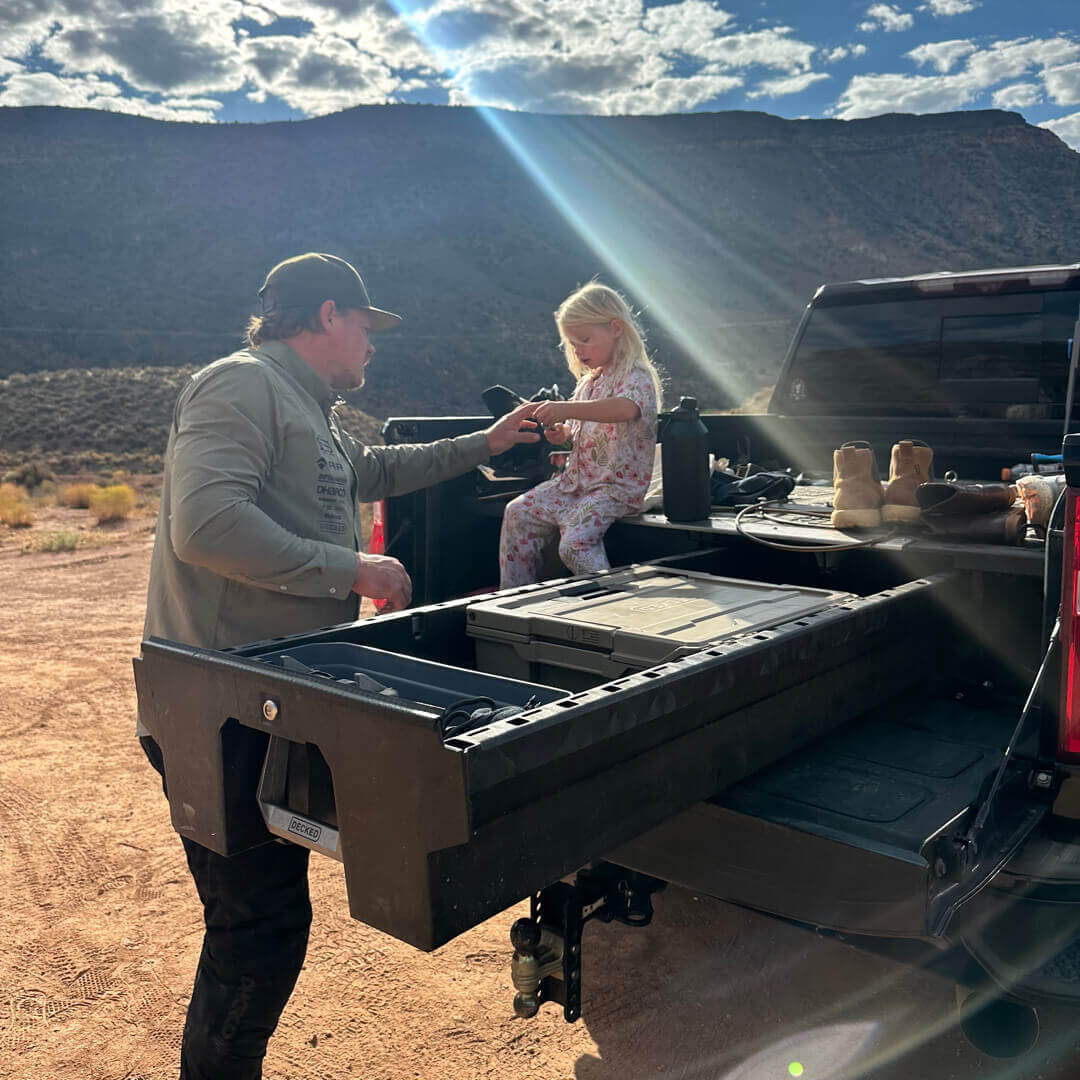 Kyle Strait loading gear into his DECKED Drawer System.