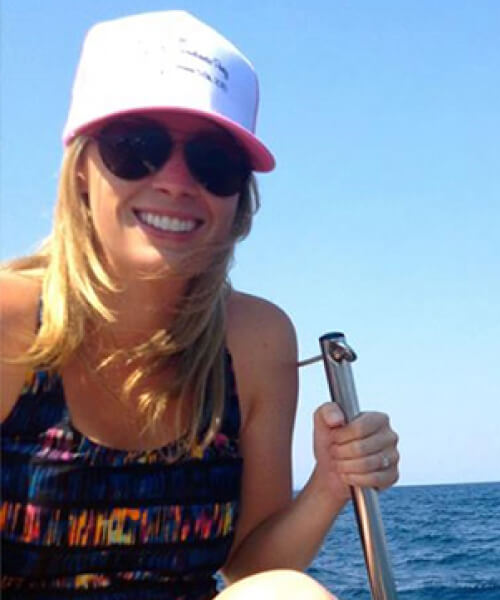 Woman smiling while on a boat