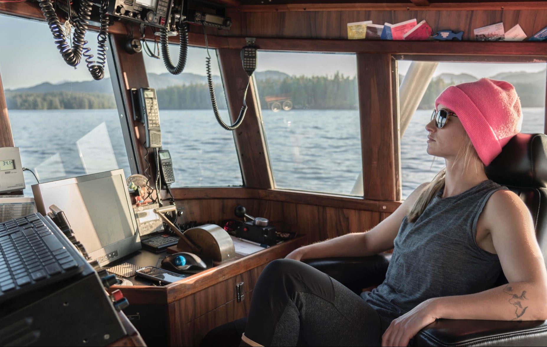 McKenna at the helm of her fishing vessel, Atlantis, off the coast of Alaska.