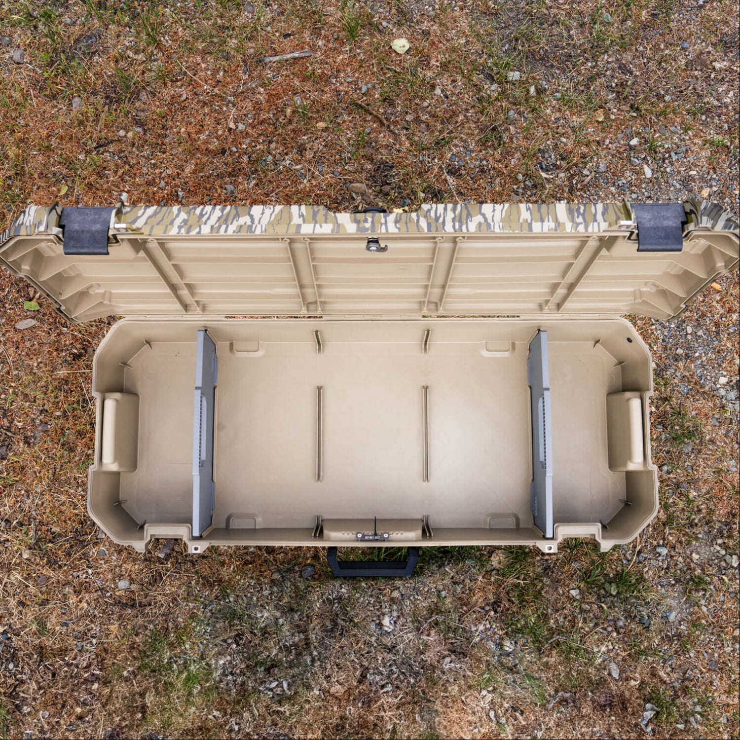 A top-down view of the camo Honcho open with interior divider storage space.