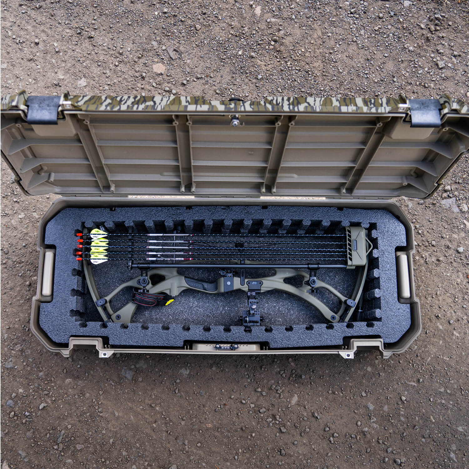 A Mossy Oak Original Bottomland Honcho with PuzzleFoam inside that has been organized to perfectly fit a compound bow.