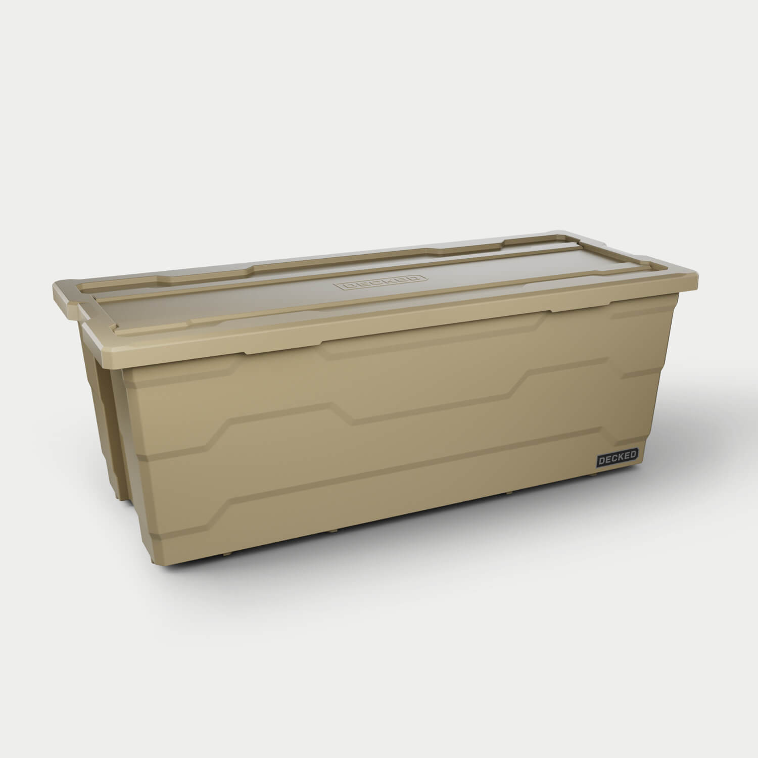 One desert tan Payloader 133 bin, closed on a white background with a DECKED logo in the bottom right hand corner of the bin.