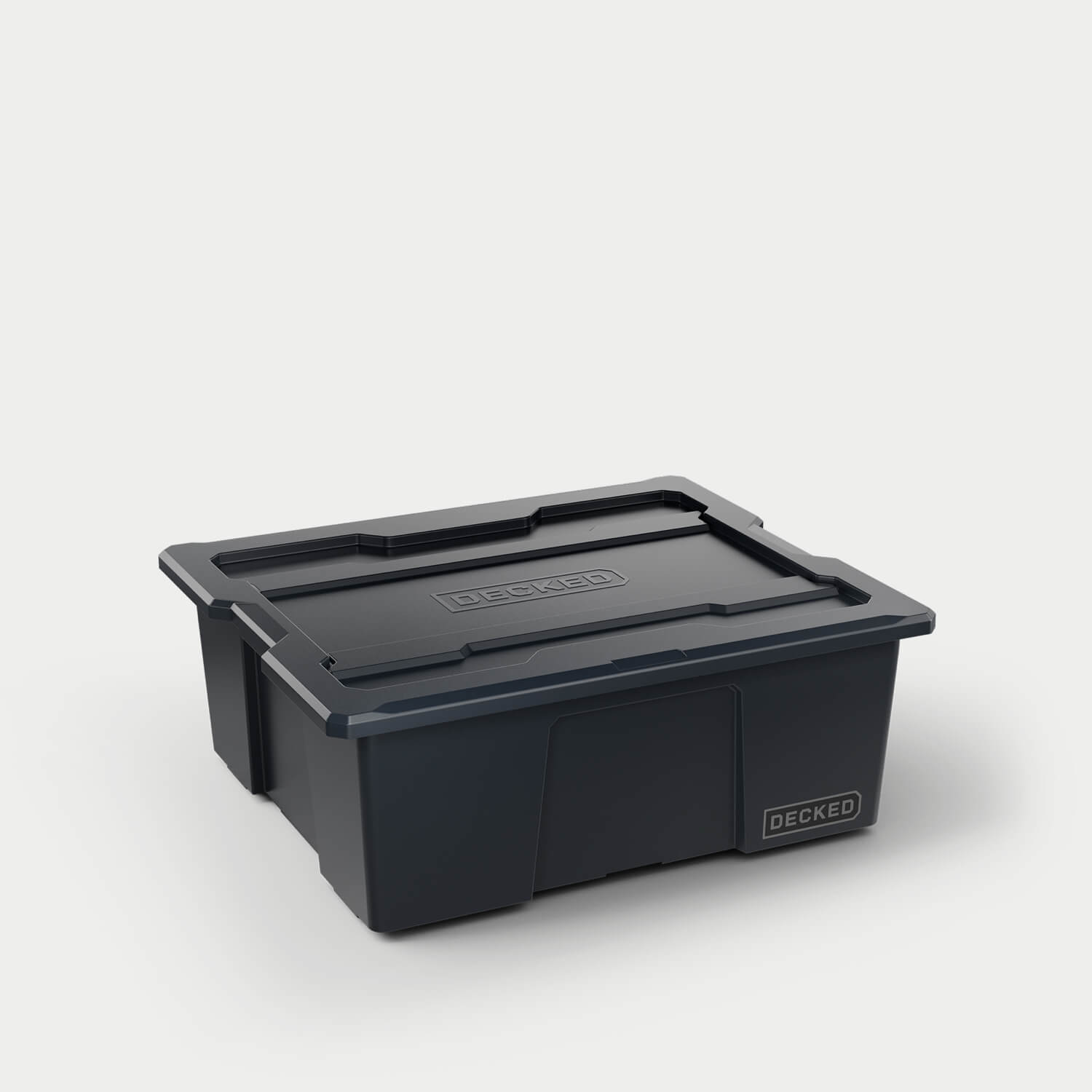 One black Payloader bin, closed on a white background with a DECKED logo in the bottom right hand corner of the bin.