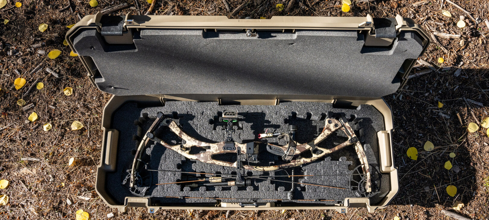 A bow and its accessories perfectly nested into the puzzlefoam for Honcho 80, keeping the bow secure and protected inside of the case.