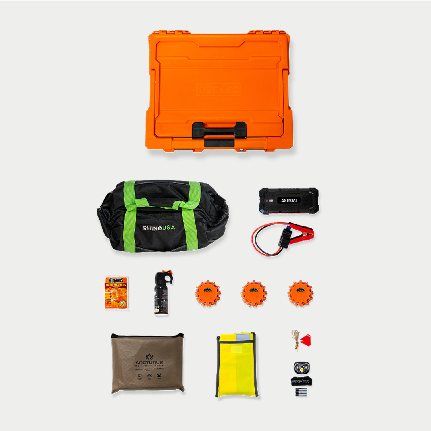 The elements of the Roadside OS Kit laid out, including the Orange D-co storage case that houses the items for safe, secure, and weatherproof storage in your truck.