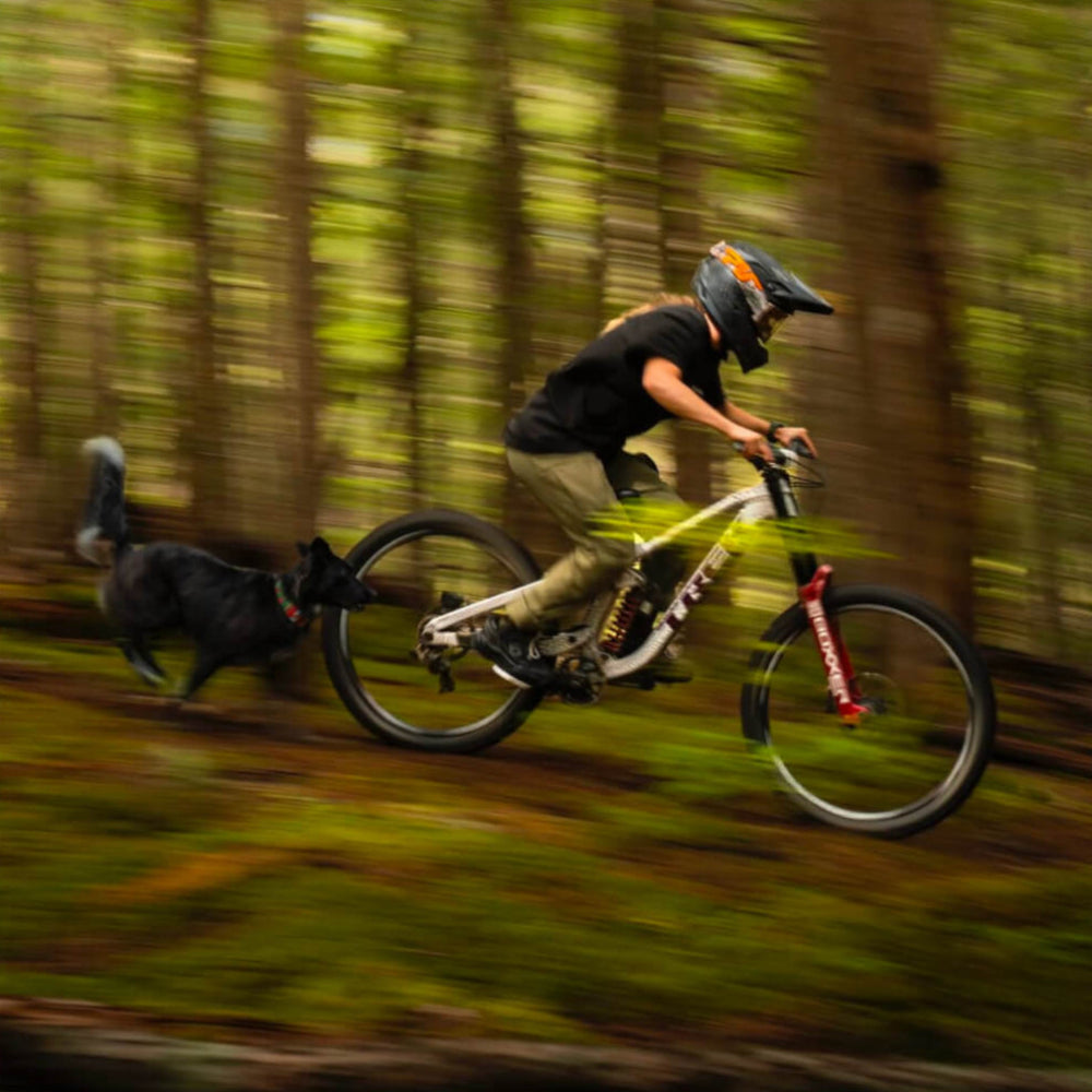 Casey and her dog ripping through the woods.