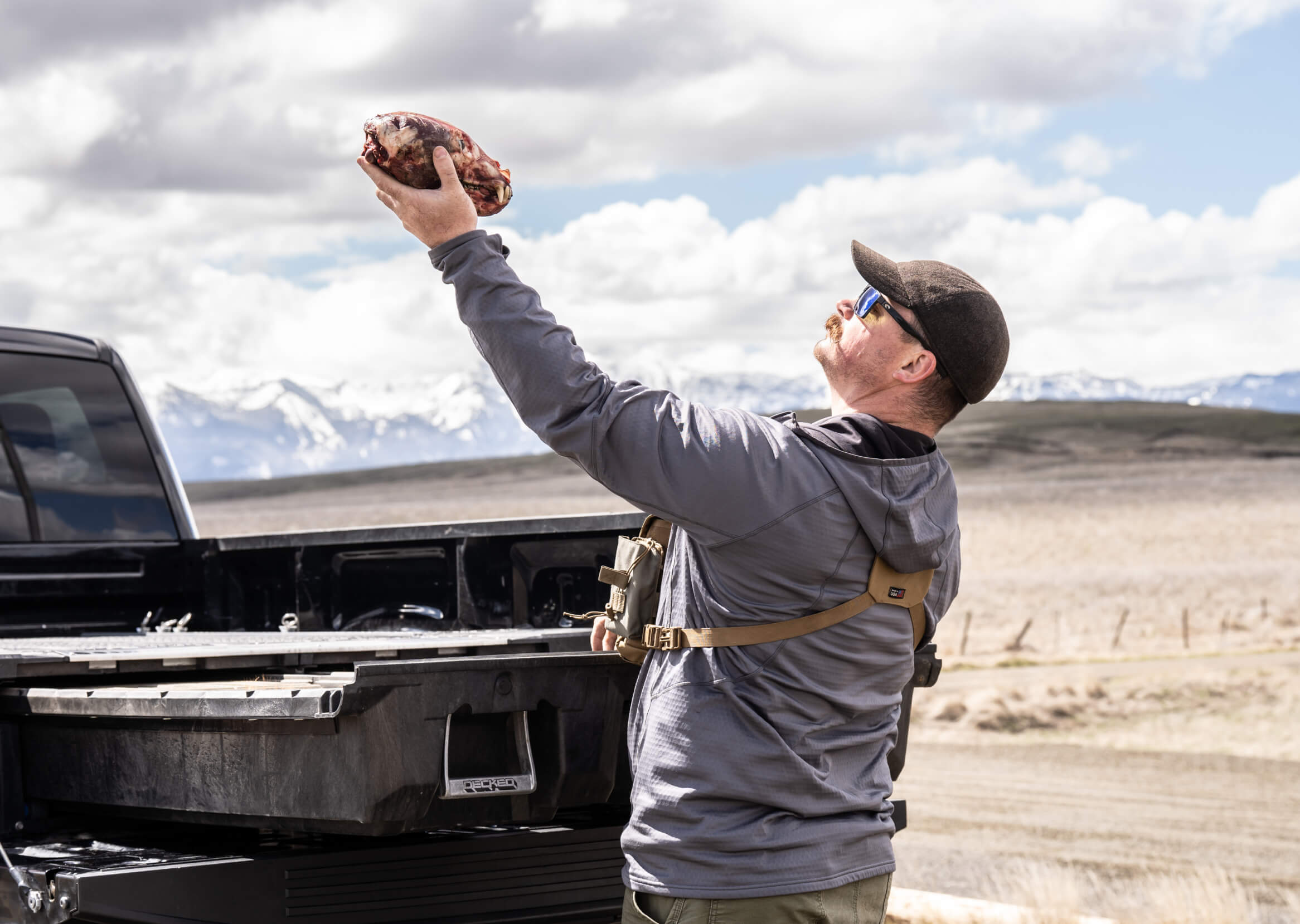 James Nash holding up some sort of skull that he pulled out of his DECKED Drawer System.