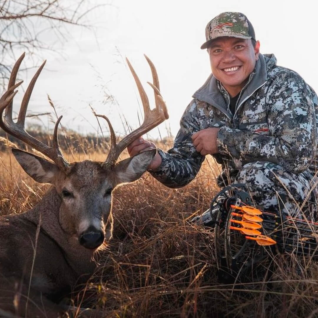 Justin Lee with his archery whitetail.