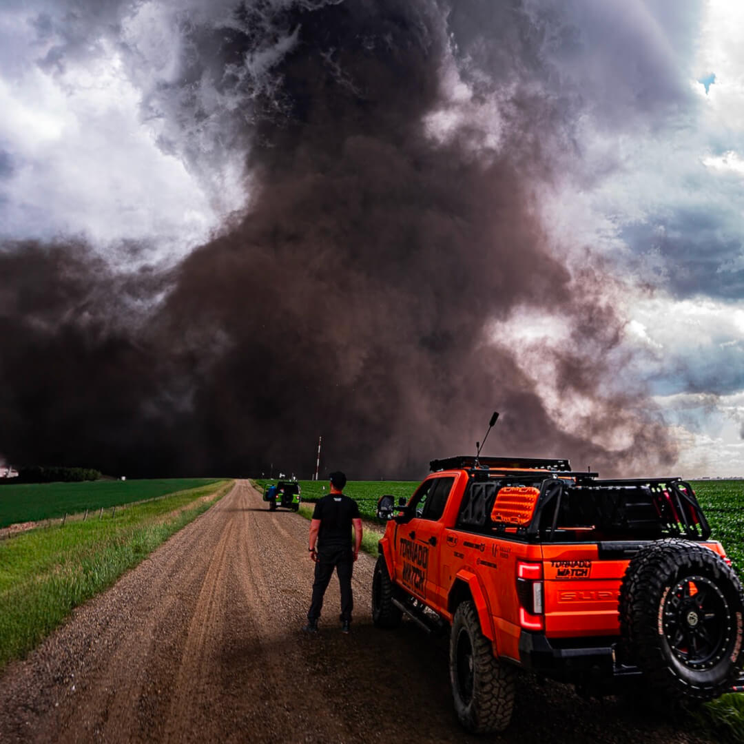 Ricky and his truck watching a growing tornado.