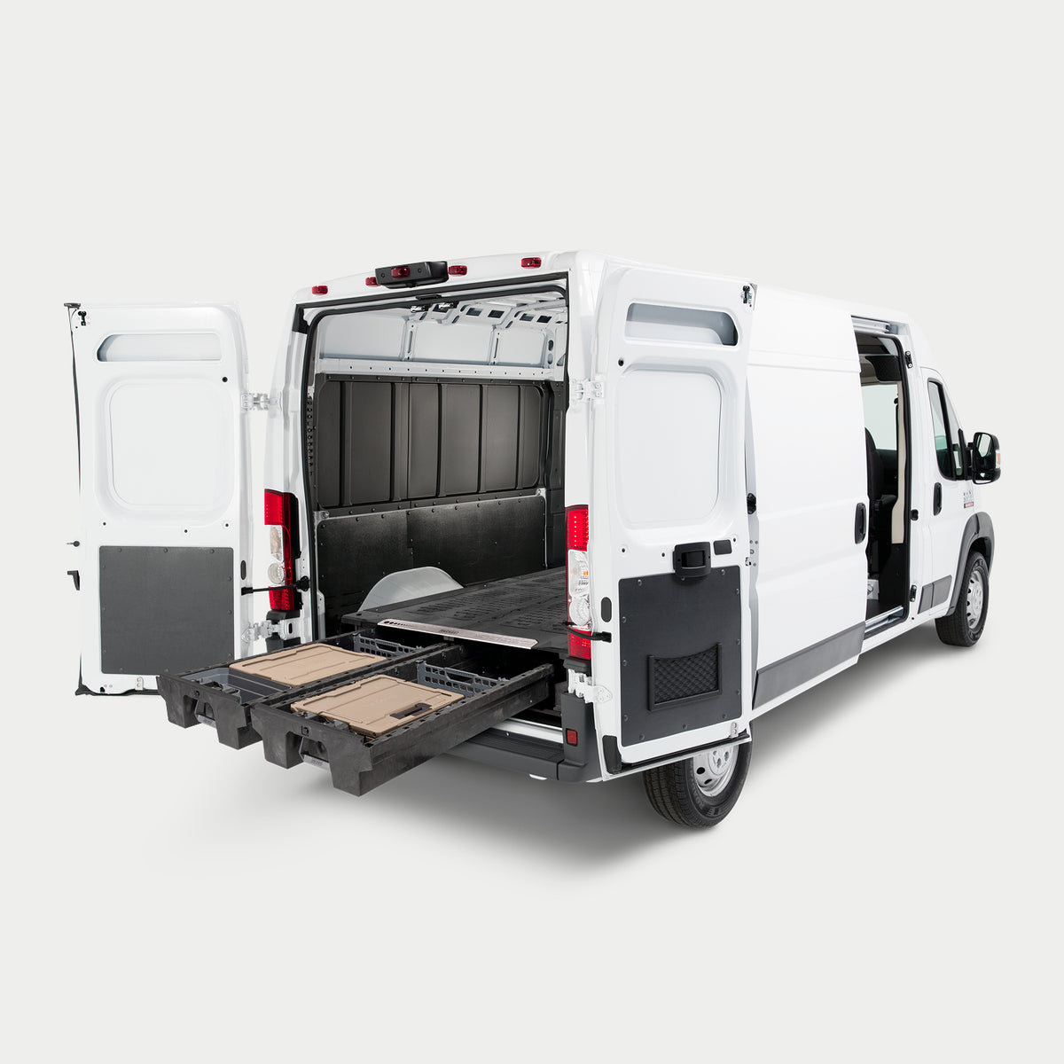 Angled image of a van with a Drawer System for cargo vans inside with drawers fully extended.