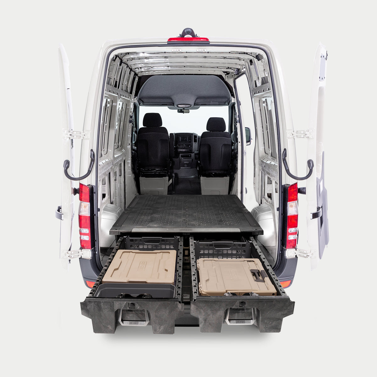 Straight-on image of a van with a Drawer System for cargo vans inside with drawers fully extended.